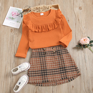 2-piece Toddler Girl Flounce Long-sleeve Ribbed Solid Top and Button Design Tassel Hem Plaid Skirt Set