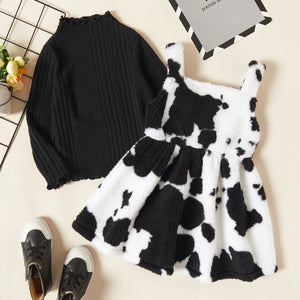 2-piece Toddler Girl Lettuce Trim Ribbed Knit Black Top and Cows Print Fuzzy Overall Dress