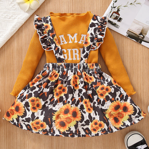 2-piece Toddler Girl Letter Print Lettuce Trim Long-sleeve Ribbed Top and Floral Print Ruffled Suspender Skirt Set