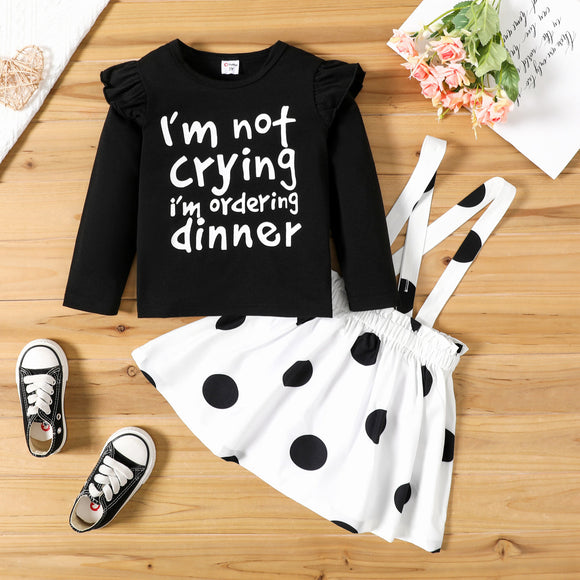 2-piece Toddler Girl Letter Print Ruffled Long-sleeve Black Tee and Polka dots Suspender Skirt Set