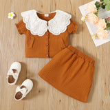 2-piece Toddler Girl Schiffy Statement Collar Button Design Ribbed Top and Elasticized Skirt Set